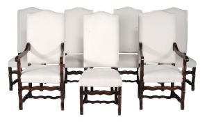 A set of seven dining chairs  , 20th century, to include two armchairs each with a rectangular back