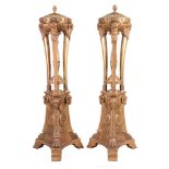 A pair of giltwood torcheres in Georgian style  , 20th century, the lidded tops with pineapple
