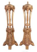 A pair of giltwood torcheres in Georgian style  , 20th century, the lidded tops with pineapple