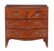 A George III mahogany chest of drawers  , circa 1800, of bow front outline, the shaped top above an