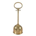 A Victorian brass and lead weighted door porter,   last quarter 19th century, with loop handle