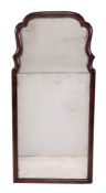 A mahogany framed wall mirror  , second quarter 18th century, the cushion frame surrounding two