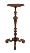 A William and Mary walnut candlestand  , circa 1690,  the octagonal top with moulded edge above the