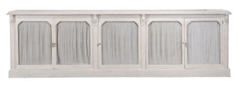 A white painted cabinet  , circa 1870, by Hobkirk  &  Co, the rectangular top with moulded edge