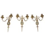 A set of six gilt brass and jasper dip porcelain inset twin light wall appliques,   circa 1900,