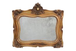 A giltwood and composition wall mirror  , early 20th century, with central cartouche and applied