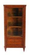 A Dutch  satinwood display cabinet  , late 19th/early 20th century, with canted corners, the