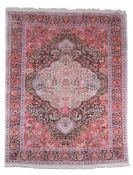 An Oriental silk carpet  ,  approximately 383 x 268cm