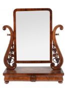 A William IV mahogany dressing table mirror,   circa 1835, the adjustable rectangular plate held