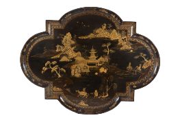 A George I black japanned and parcel gilt wood tray,   circa 1730, of cartouche outline, decorated