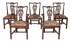 A set of ten mahogany dining chairs in George III style,   20th century, to include to carvers,