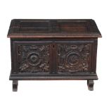 A panelled oak chest  , mid 17th century, opening to compartment and fitted candle box, the double