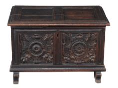 A panelled oak chest  , mid 17th century, opening to compartment and fitted candle box, the double
