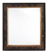 A rectangular ebonised and parcel gilt wall mirror  , early 20th century, the ebonised frame with