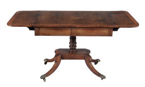 A Regency rosewood and satinwood crossbanded sofa table  , circa 1815, rectangular top including a
