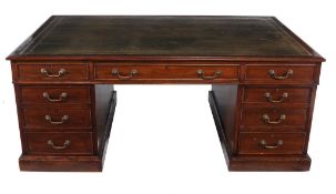A mahogany partners pedestal desk  , in George III style, the rectangular top above three frieze