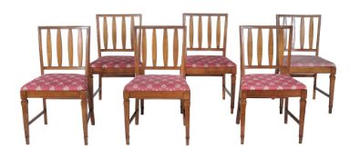 A set of six Continental walnut dining chairs,   19th century, each with a rectangular back with