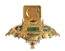 A Continental gilt metal and malachite mounted encrier,   circa 1875, the glass inkwell set within