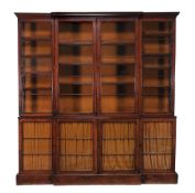 A Regency mahogany library bookcase  , circa 1815, of breakfront outline, the moulded cornice above