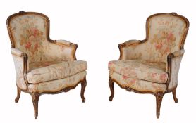 A pair of carved beech and upholstered tub armchairs in Louis XV style  , last quarter 19th