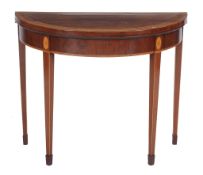 A George III mahogany card table  , circa 1800, of demi-lune outline, the rosewood banded and box