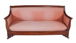 A Louis Phillipe mahogany settee  , circa 1835, the upholstered back and scroll arms above