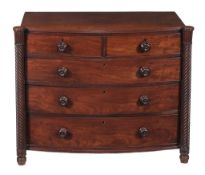 A Regency mahogany chest of drawers  , circa 1815, of bowfront outline, the shaped top with moulded