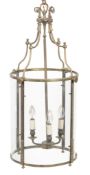 A brass and glazed hall lantern in 18th century taste,   20th century, of cylindrical form, the