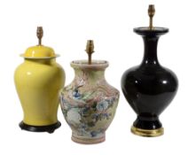 Three ceramic vases fitted as table lamps, in Chinese 18th century style,    modern, the largest