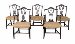 A harlequin set of twelve George III mahogany dining chairs  , 18th century and later, to include
