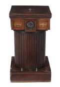 A George III mahogany and painted pedestal cupboard  , circa 1780, the square top above a roundel