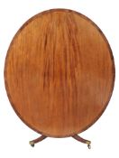 A Regency mahogany inlaid and crossbanded breakfast table  , circa 1815, oval tilt-top above a ring