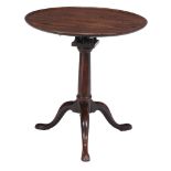 A George II mahogany birdcage tripod table  , circa 1750, the dished circular top above the