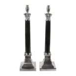 A pair of electroplated metal and black marble mounted columnar table lamps,   of recent