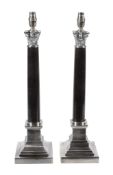 A pair of electroplated metal and black marble mounted columnar table lamps,   of recent