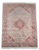 An Oriental silk carpet ,   approximately 272 x 190cm