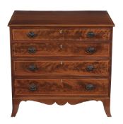 A George III mahogany chest of drawers  , circa 1800, inlaid with boxwood stringing throughout,