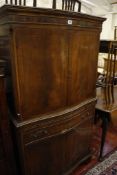A stained mahogany serpentine fronted side cabinet   in 18th century style, 20th century,