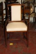 An Edwardian armchair  , a Victorian mahogany Gothic hall chair and a small mahogany tripod table