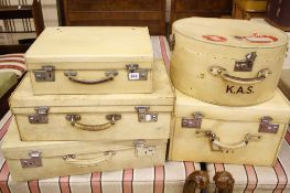 Vintage vellum luggage   of varying sizes, the trunk bearing Drew  &  Co