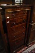 A Victorian mahogany Wellington chest   of six drawers on a plinth base 58cm wide
