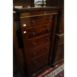 A Victorian mahogany Wellington chest   of six drawers on a plinth base 58cm wide