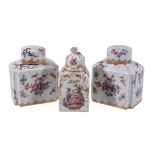 A pair of Samson tea caddies  , 10cm high and another, 12cm high (3)