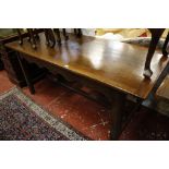 A French oak refectory table   with cleated ends