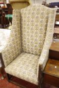 A walnut and upholstered wing armchair  , 19th century