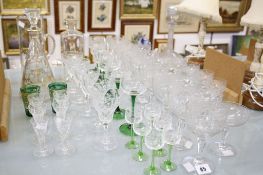 A quantity of decorative glassware,   to include two green gilded and enamelled tumblers, etched