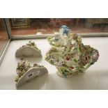 A pair of Continental porcelain wall sconces  , decorated with cherubs, 17.5cm, a porcelain floral