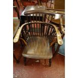 A 19th Century ash, elm and beech comb back armchair