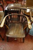A 19th Century ash, elm and beech comb back armchair