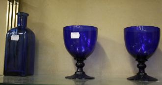 A quantity of blue glassware   to include four blue glass goblets, two decanters, jugs and bowls